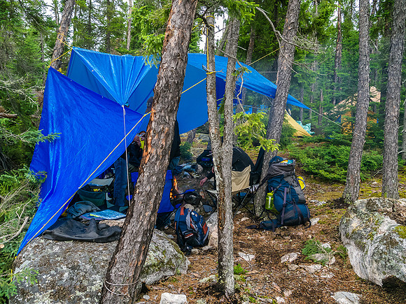 Trying to protect our camp from the brutal cold and wet wind.