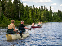 The paddles dip into Leano Lake.