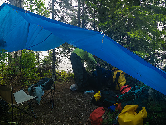 Packing up camp on Wednesday morning during a lull in the rain.