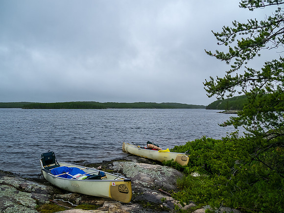 Eating lunch on Talon Lake. We're in the trees to avoid the driving wind / rain.