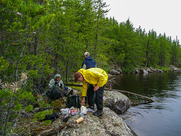 Eating lunch on Talon Lake. We're in the trees to avoid the driving wind / rain.