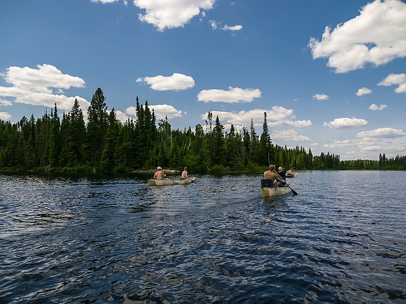 The paddles dip into Leano Lake.