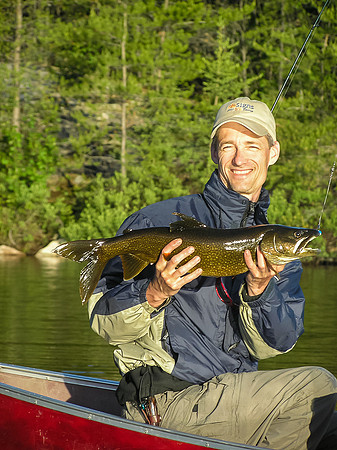 We got up early on Thursday morning to give Bill a shot at Lake Trout too. He was delighted to catch his first one!