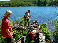 Another hot day as we complete the portage into the Haggart River.