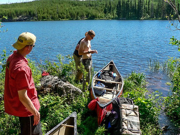 Another hot day as we complete the portage into the Haggart River.