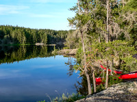 A very calm lake for fishing after supper.