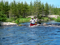 Ron and Dad run a small rapid along the Garner River.