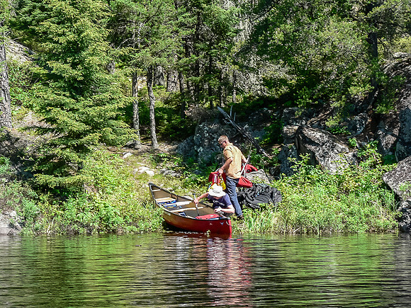 Finishing up a portage along the Garner River.