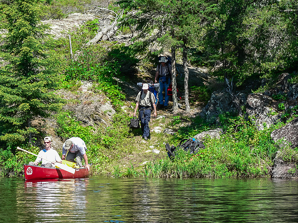 Finishing up a portage along the Garner River.