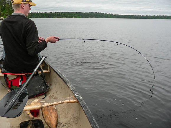 Eric with a nice size Northern Pike on his line.