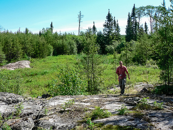Typical WCPP portage includes forest, bog and rocks. This is the 300m portage into the Haggart River.