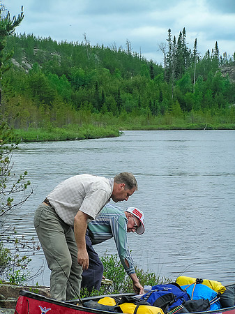 Preparing the gear after another portage.