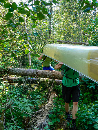 Portaging to Chase Lake.