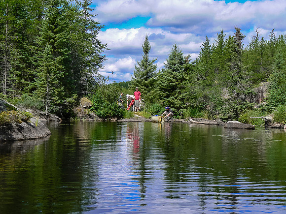 Finishing a short portage along the river from Petch to Reynar.