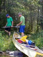 Portaging to Chase Lake.