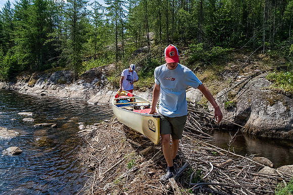 Trying to navigate down a small creek that's been dammed off by beavers. Jon maintained flip-flops on this one but his toes suffered!
