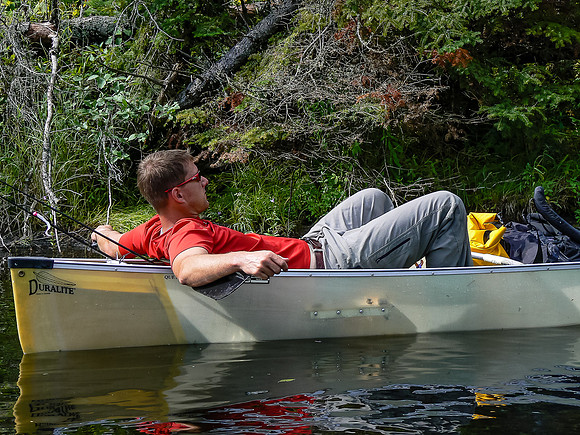Vern chills in the canoe.