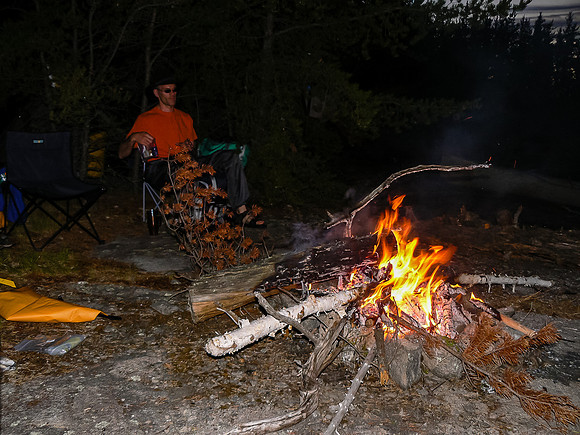 Monday comes to a close around a very cheerful bonfire.