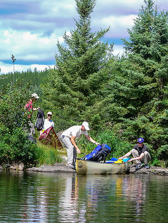 Finishing a short portage along the river from Petch to Reynar.