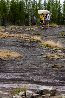 Finishing the portage into Reynar Lake from the creek running out of Petch.