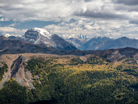 Mount Bourgeau looks great with some fresh snow. Mount Peechee rises dramatically in the far distance.