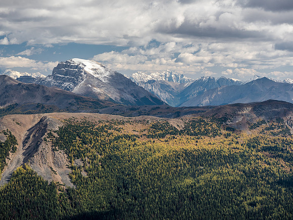 Mount Bourgeau looks great with some fresh snow. Mount Peechee rises dramatically in the far distance.