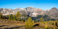 Starting the long descent to the Egypt Lakes area on the west side of Healy Pass. Sugarloaf at foreground left of center and Greater Pharaoh at foreground right.