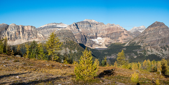Starting the long descent to the Egypt Lakes area on the west side of Healy Pass. Sugarloaf at foreground left of center and Greater Pharaoh at foreground right.