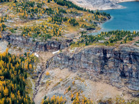 Waterfall and larches around the Mummy Lake drainage.