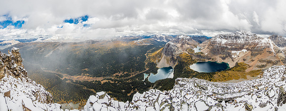 A bit wider view to the east with the clearing snow flurries and my long approach over Healy Pass at center.