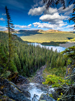 Standing on top of the waterfall from the Scarab Lake outlet stream into Egypt Lake below.