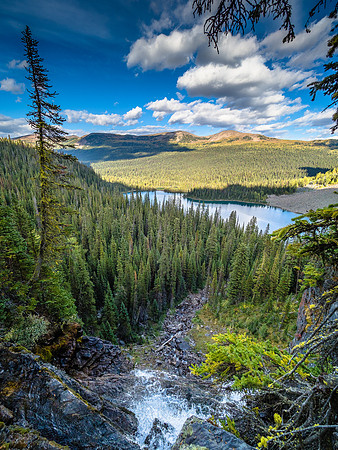 Standing on top of the waterfall from the Scarab Lake outlet stream into Egypt Lake below.