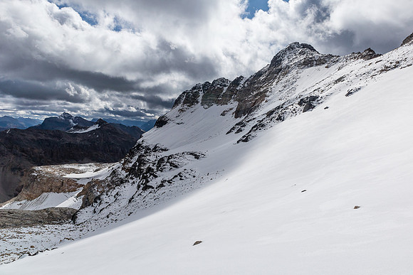 Ascending snow / glacier to the col, looking south to a nice outlier.