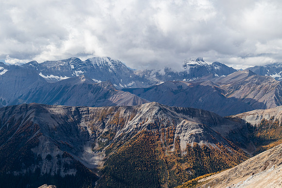 Views over Hawk Ridge towards Floe and Foster Peak covered in clouds.