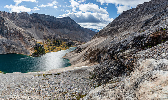 Views south over Mummy Lake - the scree bench between cliffs visible at right.