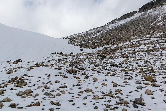 The shallower and easier second glacial bowl has less glacier and cliffs and more scree and snow.
