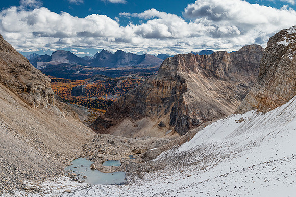 Views back over the glacial tarns to the unnamed peak east of Mummy Lake and Sunshine Meadows.