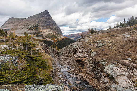 The outlet stream from Mummy Lake to Scarab Lake with Pharaoh Peak.
