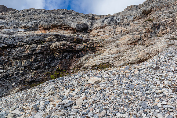 Looking up at the first cliff band. The route up is just oos to the right here.