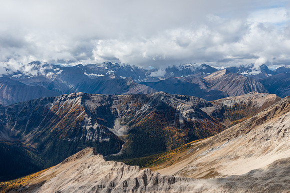 Views over Hawk Ridge towards Floe and Foster Peak covered in clouds.