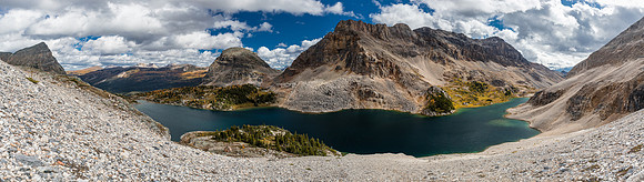 Descending back to the treed buttress with gorgeous views over Mummy Lake.