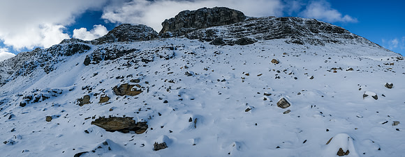 Again, up slightly left, than right above the dark shale cliffs.
