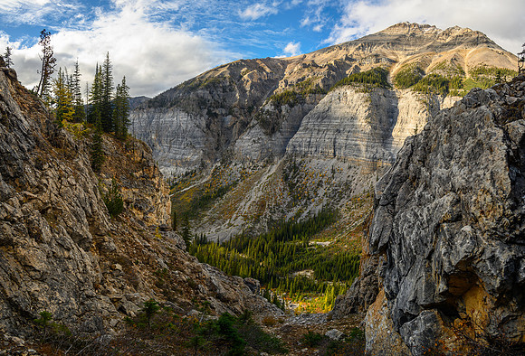 Descending the steep NW access gully with direct views of Isabelle Peak.
