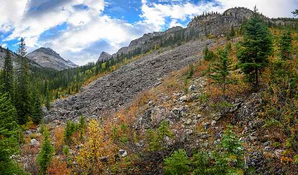 The steep access slope above at center.