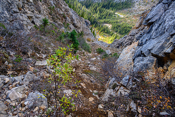 Descending the steep NW access gully to Hawk Creek.