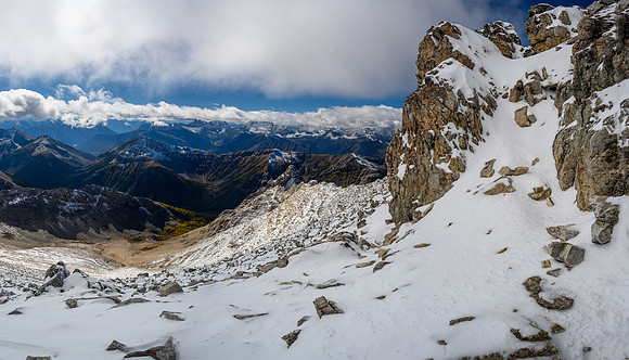 Ascending a snowy ramp to the summit block.