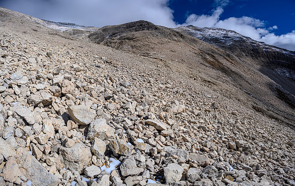 Ascending SW rubble slopes to the summit.