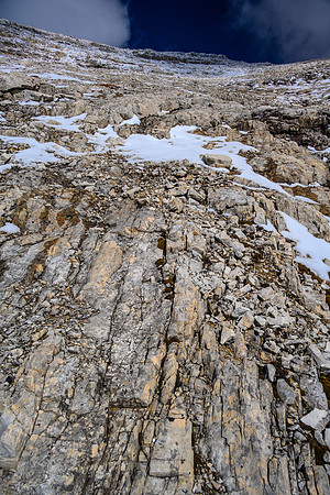 Ascending SW rubble slopes to the summit.