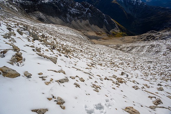 Descending rubble slopes on the upper south aspect.