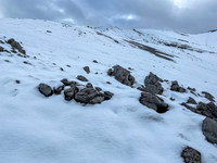 Looking up the very foreshortened and very snowy (!!) west ridge to the summit.